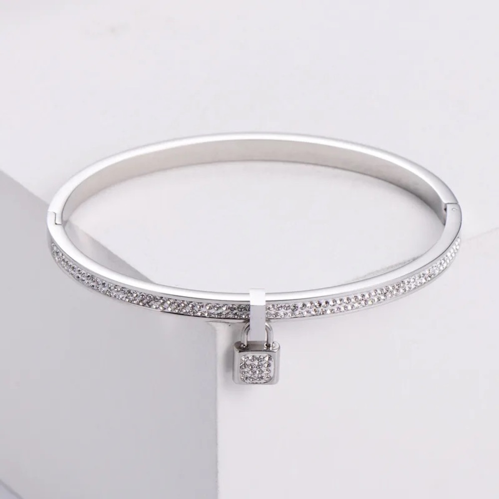 Elegant Silver Bangle with Lock Charm